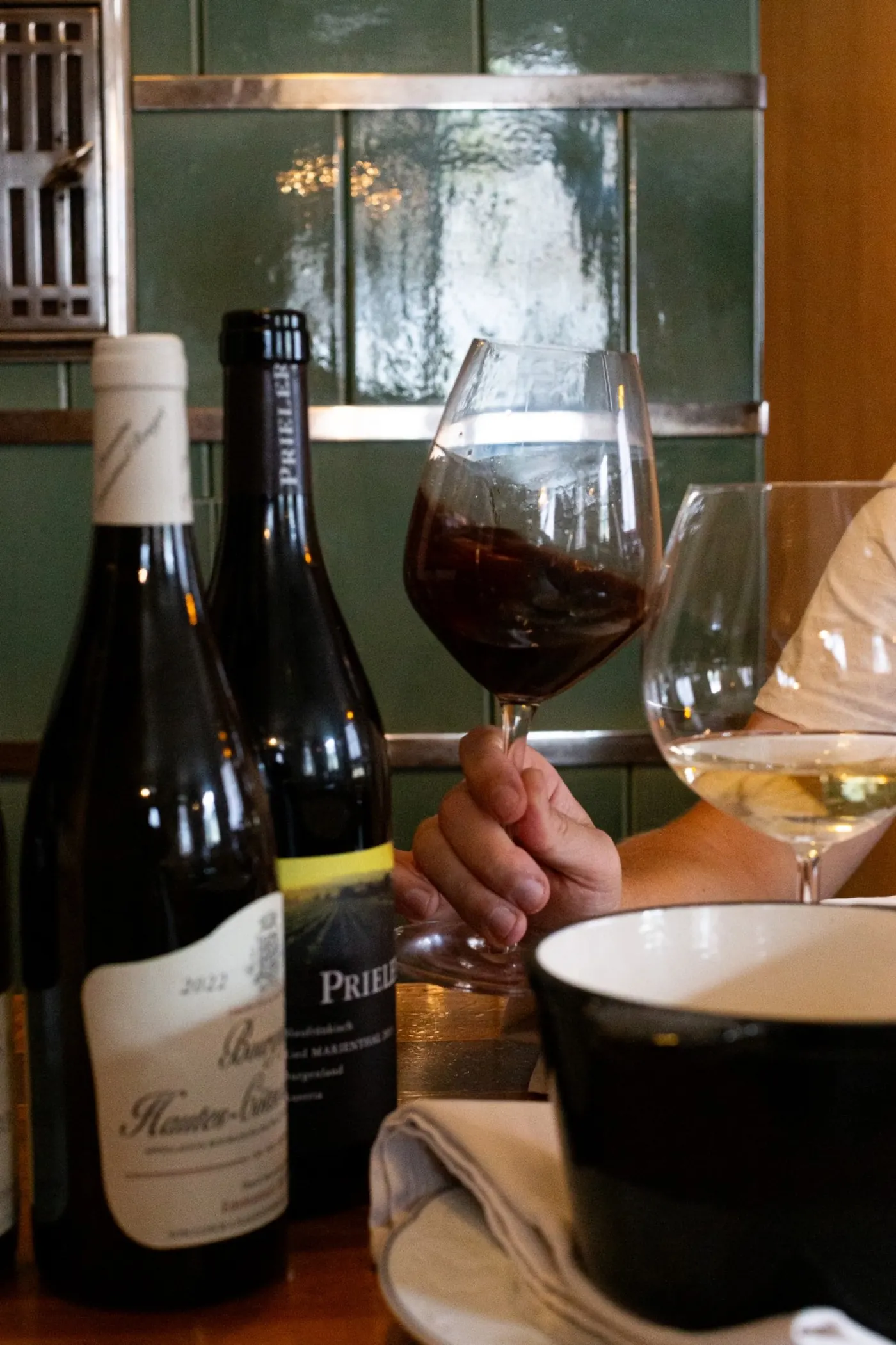Fondue pot and glasses of Austrian wine